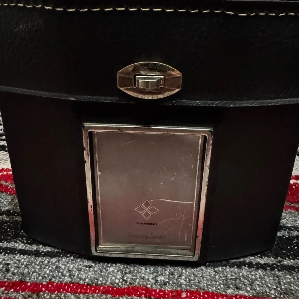 Canon Black and Silver Camera with Detachable Flash